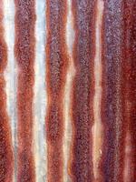 Rusty metal, mostly metal, brown metal wall.,oxidation of iron or steel. photo