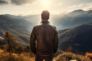 AI generated a man looking at the sun in the mountains view from the back photo