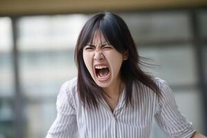 AI generated Woman of Asian appearance who appears to be furious photo