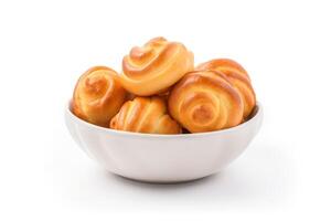 AI generated Delicious sweet buns in bowl isolated on white background photo