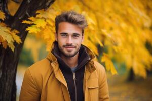 ai generado retrato de contento hombre con otoño al aire libre foto