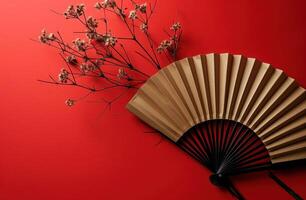 AI generated handmade paper fan with flower on a red background photo