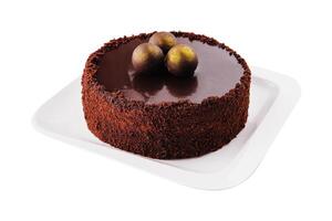 Tasty chocolate cake on white background photo