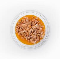 Chia pudding with mango and granola top view photo