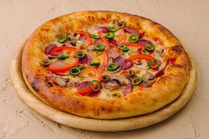 Italian pizza on wooden board photo