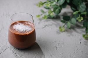 chocolate smoothie with coconut flakes photo