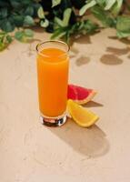 Citrus juice with orange and grapefruit top view photo