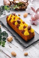 easter cake with chocolate and vanilla cream photo