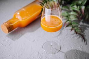 Orange Juice in glass top view photo