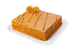 Coffee Walnut Layer Cake on white plate photo