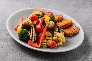 Various barbecue grilled vegetables on plate photo