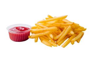 French fries and ketchup on white background photo