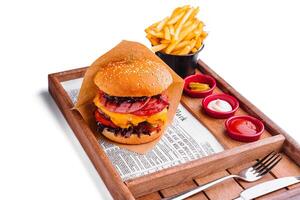 burger with different types of sausages and fries photo