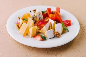 Cheese board with different types of cheese photo