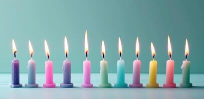 AI generated a row of burning birthday candles lined up on a blue background photo