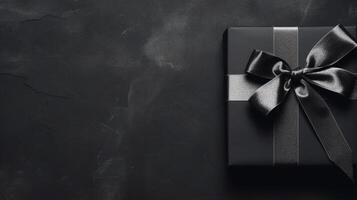 AI generated A black gift box with a silver ribbon on a dark textured surface photo