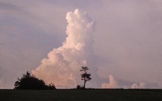 a large cloud in the sky photo