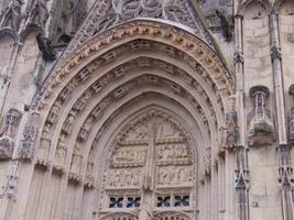 a large building with a large archway photo