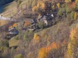 a small village on a hillside photo