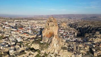 Aerial drone view of the Ortahisar Castle in Cappadocia, Turkey. People enjoying the view from the top of the castle. video