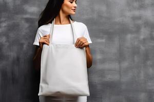 AI generated caucasian woman holding blank white tote bag made of canvas fabric with handle on her neck, mock up design, neural network generated photorealistic image photo