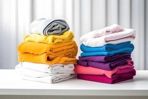 AI generated two colorful stacks of folded clothes on white laundry table, neural network generated photorealistic image photo