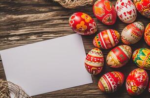 ai generado más Pascua de Resurrección huevos con un blanco blanco papel foto