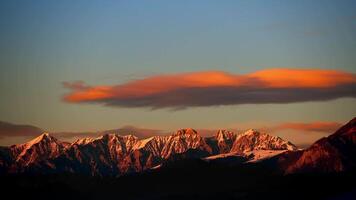 Time-lapse with moving cloud over the mountains video