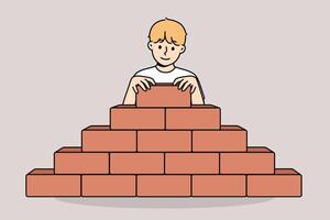 Little boy builds pyramid bricks, wanting to become builder and enroll in architectural university vector