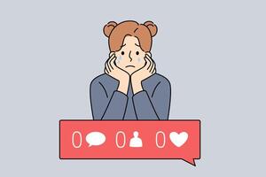Girl is sad because of digital addiction and lack of subscribers and likes on social networks vector