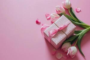 AI generated a gift box with pink flowers and tulips is sitting on a pink background photo