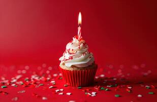 AI generated cupcake with a candle against red background, photo