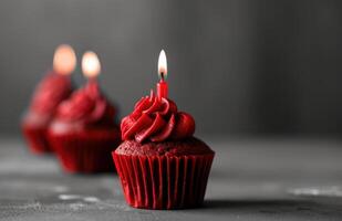 AI generated one of a dozen red cupcakes holding one candle photo