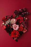 AI generated flowers arranged in a heart shape on a red background photo