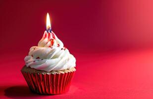 AI generated cupcake with a candle against red background, photo