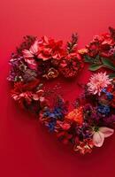 AI generated flowers arranged in a heart shape on a red background photo