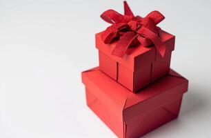 AI generated two red gift boxes with a bow on top of each other photo