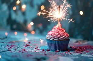 AI generated sparkly cupcake with sparkling sparkler on a blue background photo