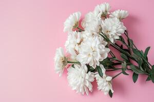 AI generated white flower bouquet on pink background photo