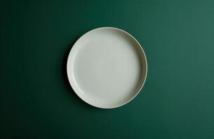 AI generated white circular plate on a green background photo