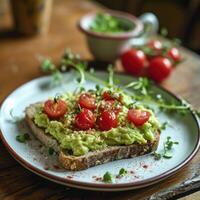 ai generado un rebanada de un pan con machacado aguacate y Tomates y un Cereza en eso foto