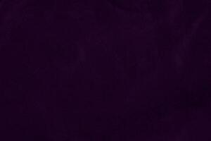 Dark purple velvet fabric texture used as background. violet color purple fabric background of soft and smooth textile material. crushed velvet .luxury dark tone for silk. photo