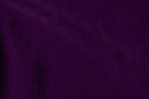 Dark purple velvet fabric texture used as background. violet color purple fabric background of soft and smooth textile material. crushed velvet .luxury dark tone for silk. photo