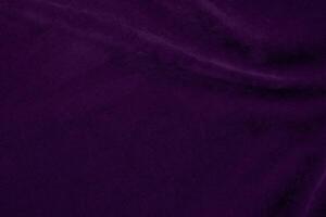Dark purple velvet fabric texture used as background. violet color purple fabric background of soft and smooth textile material. crushed velvet .luxury dark tone for silk. photo