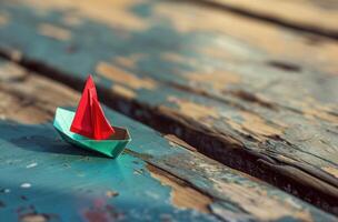 ai generado un pequeño papel barco con rojo vela en de madera cubierta foto