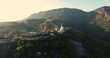 Aerial View of Wat Pha Sorn Kaew with Buddha Statue and Pagoda at Sunset, Phetchabun, Thailand video