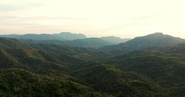 Aerial view of Flight Towards Valley at Sunset video