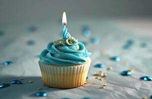 AI generated a blue birthday cupcake with a candle in it photo