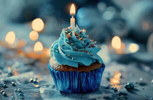 AI generated a blue birthday cupcake with a candle in it photo