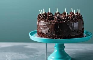 AI generated a chocolate birthday cake sits on a blue cake plate photo